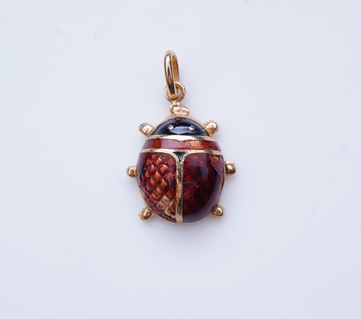 A gold and enamel pendant, Italy, 1960s